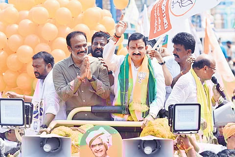 BJP Vijayawada West contestant Y Sujana Chowdary takes out a rally to file his nomination papers on Thursday