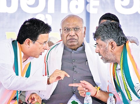 Congress in-charge of Karnataka Randeep Singh Surjewala, AICC chief Mallikarjun Kharge and DCM DK Shivakumar at a poll rally in Kalaburagi on Friday