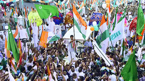 UDF candidate Hibi Eden greeting party workers at the grand finale of campaigning in front of the Town Hall on Wednesday.
