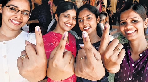 Young voters after casting their votes at Purameri, Kozhikode