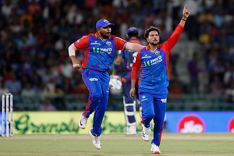 Kuldeep Yadav celebrates a wicket.