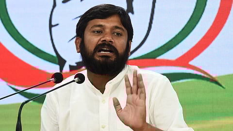 Congress leader Kanhaiya Kumar addresses a press conference from the party's headquarters in New Delhi.