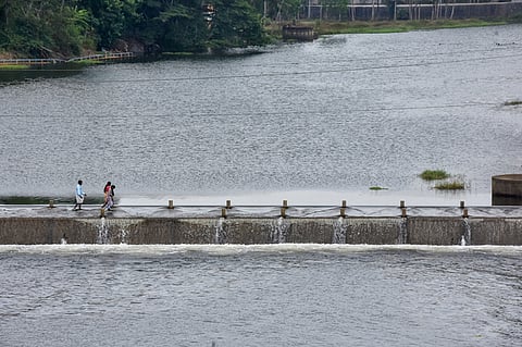 After few weeks water release from pechiparai dam, water flow in Thamirabarani river, public walk throw the water at Kulitha