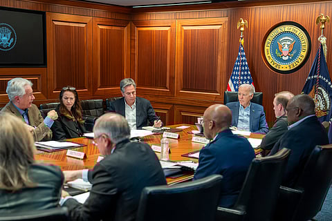 President Joe Biden, along with members of his national security team, receive an update on an ongoing airborne attack on Israel from Iran, as they meet in the Situation Room of the White House in Washington, Saturday, April 13, 2024.