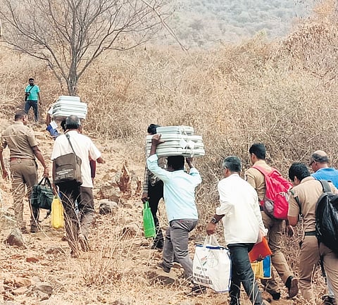 Election officials took the voting machines by trekking and using donkeys and tractors in three districts of western Tamil Nadu.