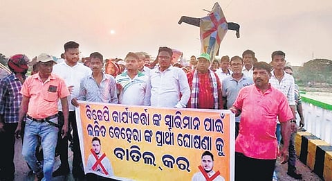 BJP leaders protesting the candidature of Lalit Behera at Rajnagar on Thursday