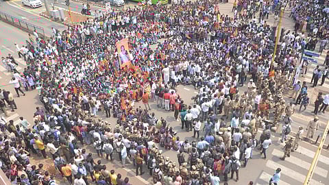 A large number of students gather in front of BVB college, demanding justice for Neha Hiremath, in Hubballi on Friday
