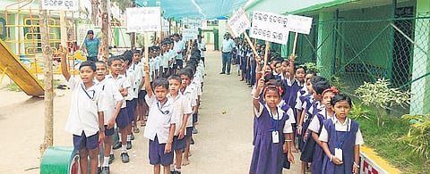 Students of Ashram School at Pandripani taking out a rally on Thursday