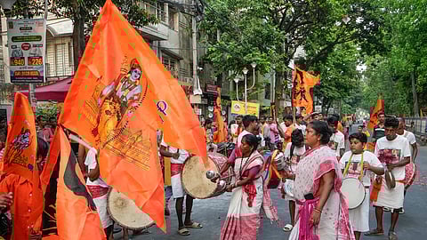 Devotees participate in a 'Ram Navami' procession, in Kolkata, Wednesday, April 17, 2024.
