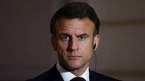 French President Emmanuel Macron looks on during a joint statement with Serbian President Aleksandar Vucic, before a working dinner at the Elysee Palace in Paris, Monday, April 8, 2024.