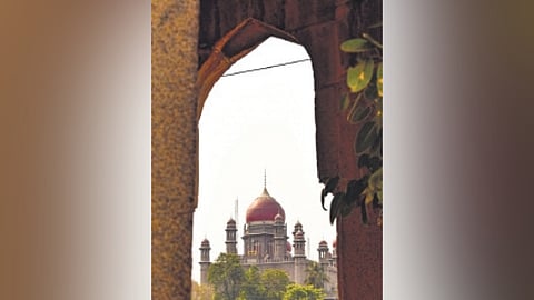 Pic by Emaduddin that bagged the 1st prize, showing the High Court’s domes through an arch.