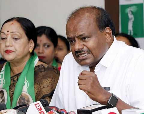 Former CM H D Kumaraswamy with his JD party women wing addressing a press meet