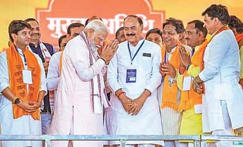 Prime Minister Narendra Modi at a public meeting in Morena of Madhya Pradesh on Thursday. Union Minister and BJP leader Jyotiraditya Scindia can also be seen .