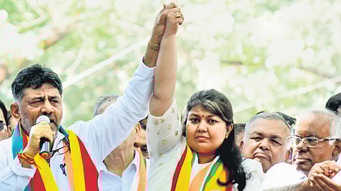 Congress candidate from Bengaluru South constituency Sowmya Reddy arrives in a rally with DCM D K
Shivakumar to file her nomination at Jayanagar in Bengaluru on Monday
