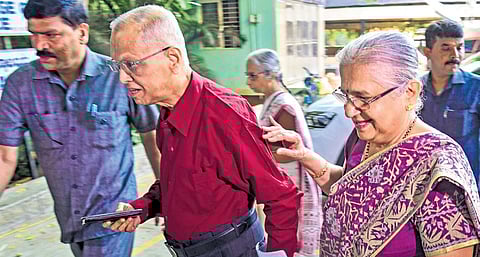NR Narayana Murthy and wife Sudha Murthy coming to cast their vote in a polling booth in Bengaluru