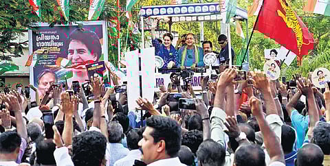 AICC general secretary Priyanka Gandhi greets people during a roadshow alongside
UDF candidate Shashi Tharoor and senior Congress leader Ramesh Chennithala at Valiyathura in Thiruvananthapuram on Saturday.