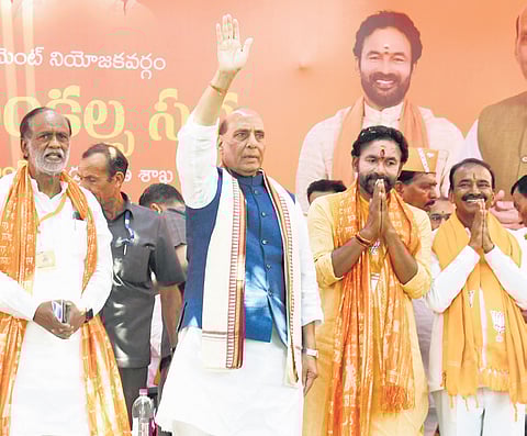 Defence Minister Rajnath Singh waves to the crowd at the Vijaya Sankalpa Sabha organised before BJP Secunderabad candidate G Kishan Reddy filed his papers on Friday.