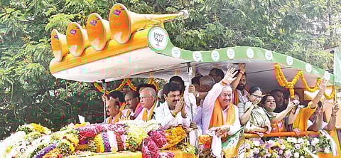 BJP Shivamogga candidate BY Raghavendra takes out a procession, accompanied by former chief ministers BS Yediyurappa, Basavaraj Bommai and HD Kumaraswamy, as part of his nomination filing, in Shivamogga on Thursday