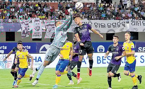 Action from the playoff match between Kerala Blasters & Odisha FC