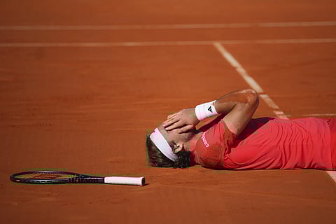 Stefanos Tsitsipas of Greece reacts after winning the second set against Casper Ruud of Norway to win the Monte Carlo Tennis Masters final match 6-1, 6-4 in Monaco, Sunday, April 14, 2024.
