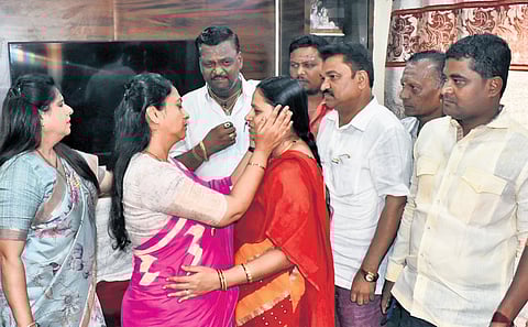 State Women Commission Chairperson Dr Nagalakshmi Choudhary consoles Neha’s mother in Hubballi