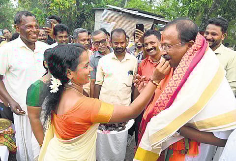 Supporters greet V Muraleedharan during his campaign at Attingal.