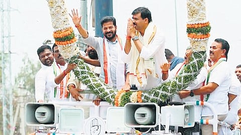 CM A Revanth Reddy and Congress leader Vamshi Chand Reddy in a rally.
