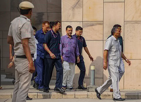In this Thursday, March 28, 2024 file photo Delhi Chief Minister and AAP convenor Arvind Kejriwal leaves the Rouse Avenue Court where he was produced in the excise policy-linked money laundering case, in New Delhi.