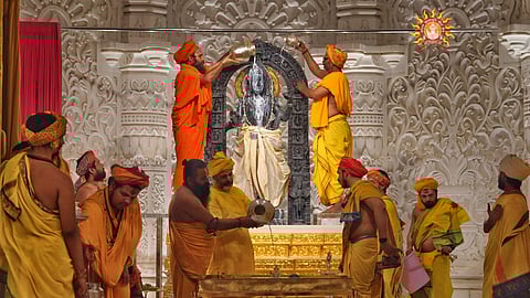 Ayodhya: Priests perform 'abhishek' of Ram Lalla on the occasion of 'Ram Navami' festival, at the Ram Temple in Ayodhya,