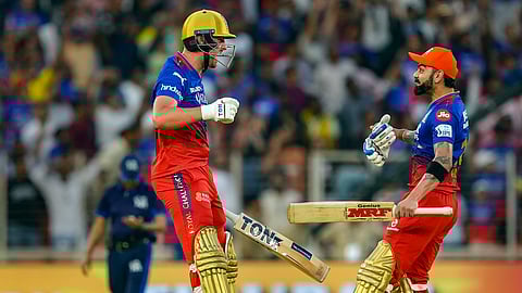 RCB's Virat Kohli and Will Jacks celebrate after winning the Indian Premier League (IPL) 2024 T20 cricket match between Gujarat Titans and Royal Challengers Bengaluru, at the Narendra Modi Stadium, in Ahmedabad, Sunday, April 28, 2024.