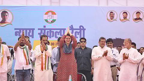 Congress General Secretary Priyanka Gandhi takes part in a poll rally in Dharampur, Gujarat on Saturday.