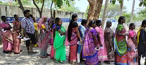 Tribals from Poochi kottam parai settlement have arrived to polling booth in Thirumoorthy tribal settlement in Udumalaipet