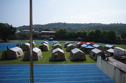 Tents for local residents evacuated following an earthquake are seen at a temporary center at an elementary school in Hualien on April 4, 2024.