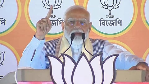 Prime Minister Narendra Modi addresses an election rally in Jalpaiguri, West Bengal on Sunday, April 7, 2024.