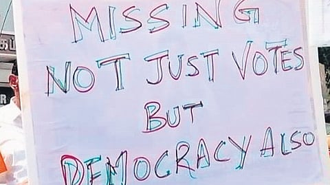 The protesters, most of them with electoral stain on their fingers, raised slogans against the EC