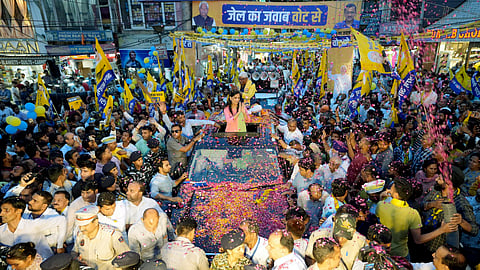 Jailed Delhi Chief Minister Arvind Kejriwal's wife Sunita Kejriwal greets supporters during an election roadshow in support of Aam Aadmi Party's (AAP) candidate from West Delhi constituency Mahabal Mishra for the Lok Sabha polls, in New Delhi.