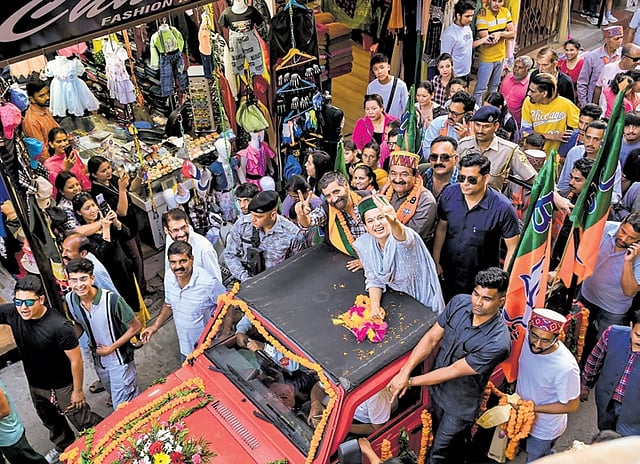 Actor Kangana Ranaut hold's a road shopw as part of her Lok Sabha polls campaign in Himachal Pradesh's Mandi district.