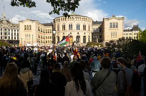 People gather in support of the Palestinain people, amid the conflict with Israel, in front of the parliament building in Oslo, Norway, on May 19, 2021.