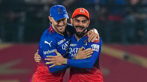 Royal Challengers Bengaluru's captain Faf du Plessis and Virat Kohli celebrates the wicekt of Punjab Kings Liam Livingstone during an Indian Premier League (IPL) 2024.