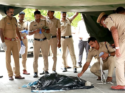 Police inspecting the spot were a threw a newborn child at Vidhya nagar near Panambilly Nagar in Kochi on Friday.