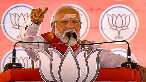 Prime Minister Narendra Modi addresses an election campaign rally for Lok Sabha polls, in Karimnagar.