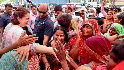 Congress leader Priyanka Gandhi Vadra interacts with supporters during a rally for Lok Sabha elections, in Amethi.