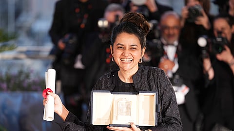 Payal Kapadia, winner of the grand prize for 'All We Imagine as Light,' poses for photographers during the photo call following the awards ceremony at the 77th international film festival, Cannes, southern France, Saturday, May 25, 2024.