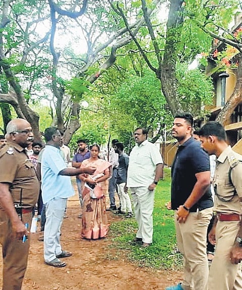 Forest officials on the university campus on Thursday