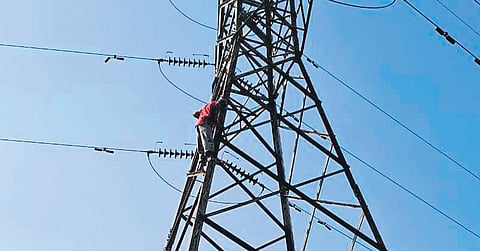 Veeramani climbed the 30-ft high voltage electricity tower in Valparai