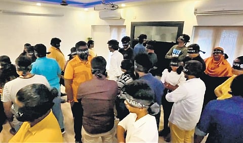 Participants at the blindfolded conversations