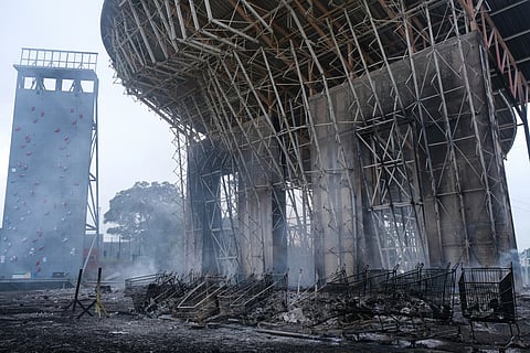 A burnt climbing wall is pictured in the Magenta district of Noumea on May 15, 2024 amid protests linked to a debate on a constitutional bill aimed at enlarging the electorate for upcoming elections of the overseas French territory of New Caledonia.