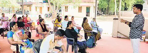 Two other officers take classes to competitive exam-aspirants in Pollachi