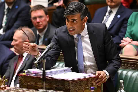 A handout photo released by the UK Parliament shows Britain's PM Rishi Sunak speaking during the weekly session of Prime Minister's Questions (PMQs), in the House of Commons in central London, on May 15, 2024.