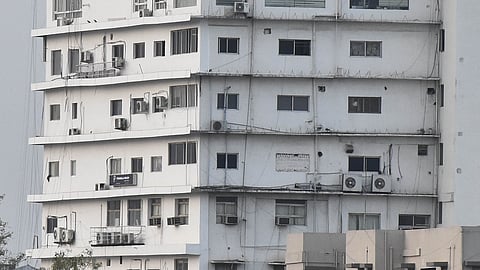 Large numbers of Air Conditioners out door unit can be seen at various buildings and apartments in Coimbatore on Tuesday.